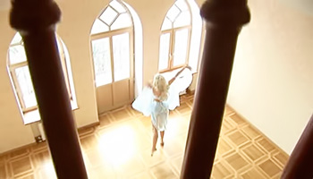 Blonde babe dances around the room